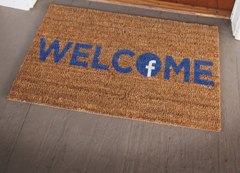 Facebook logo on the letter o of a welcome mat